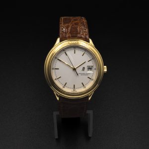 Audemars Piguet Huitième yellow-gold watch with light dial and brown crocodile leather strap
