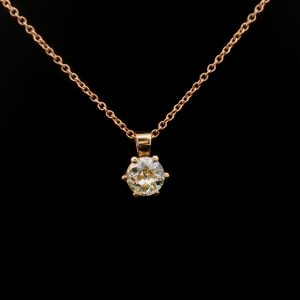 18K yellow gold pendant with a 0.87 ct Fancy Light Yellow diamond in a brilliant cut.