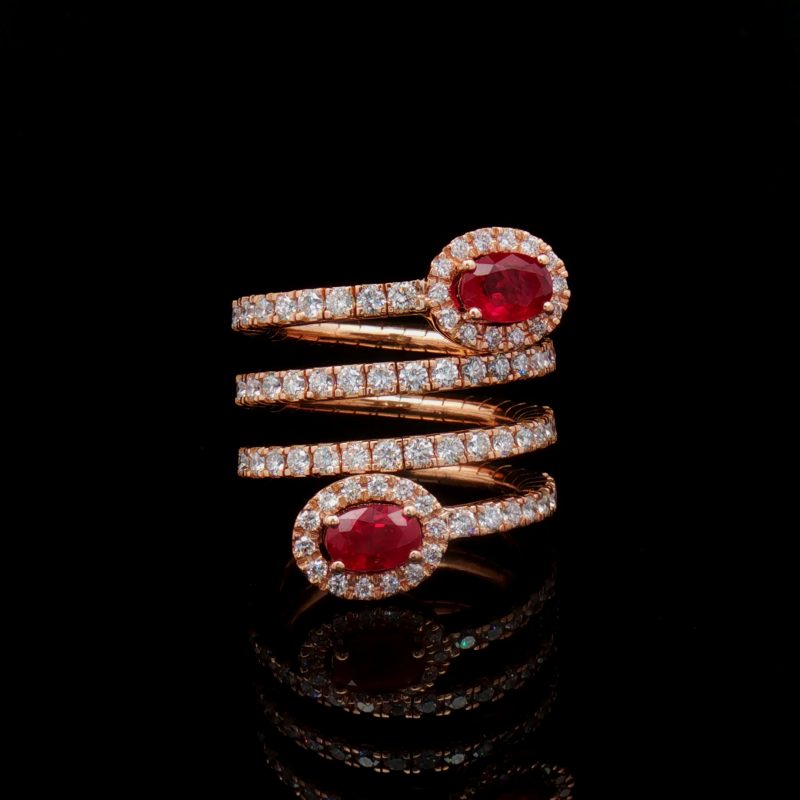 18K rose gold spring ring with two oval red rubies and 76 brilliant-cut diamonds totalling approx. 1.10 ct.
