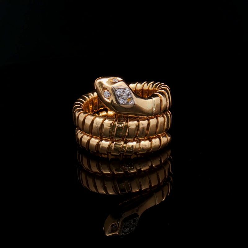 Tubogas snake ring in 18-karat yellow gold with six 8/8-cut diamonds, inspired by 1970s Italian jewellery.