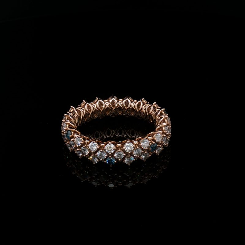 Flexible 18K gold diamond ring with 57 white and greenish-blue diamonds, approximately 1.71 ct in total.