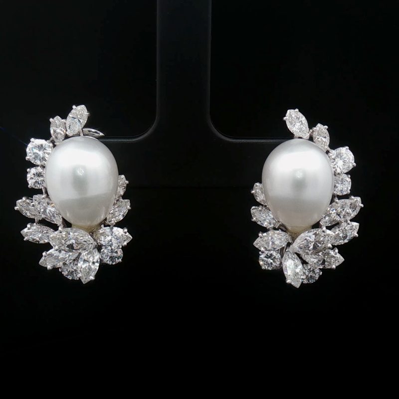 Spectacular vintage platinum clip earrings with large cultured pearls and 4.30 ct of marquise- and brilliant-cut diamonds, G/VVS.