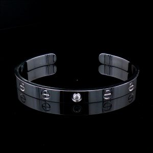 Kolekcjonerska bransoletka Cartier LOVE Cuff z białego złota 18K z diamentem 0,10 ct, rozmiar 17.